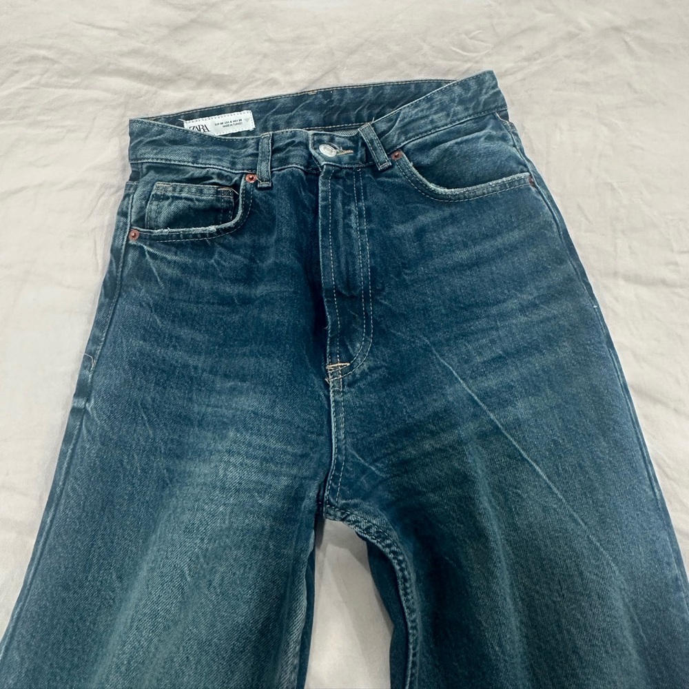 High waisted blue jeans